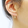 dainty earrings with white diamond
